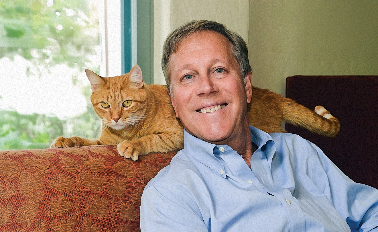 Gioia and his cat sitting on a couch