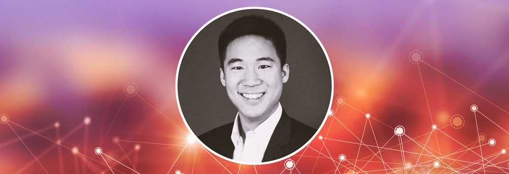 Headshot of Ian Chan against plain background