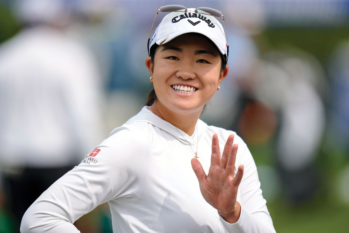 Zhang waving to the camera