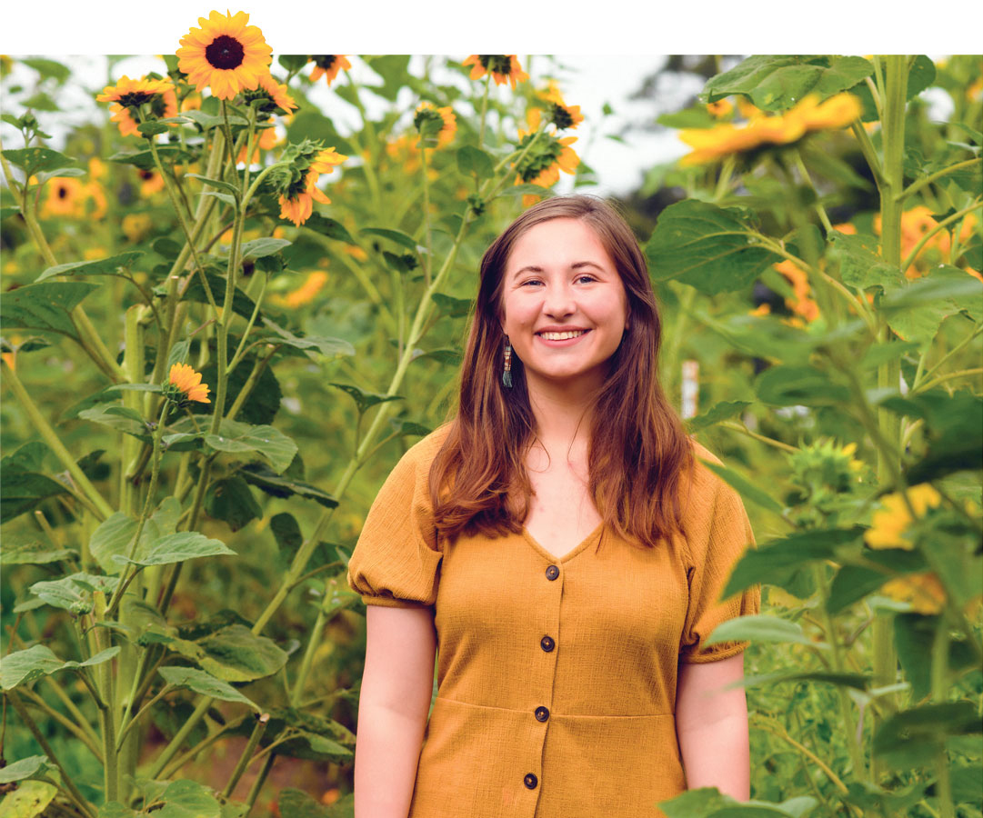 Smith with sunflowers