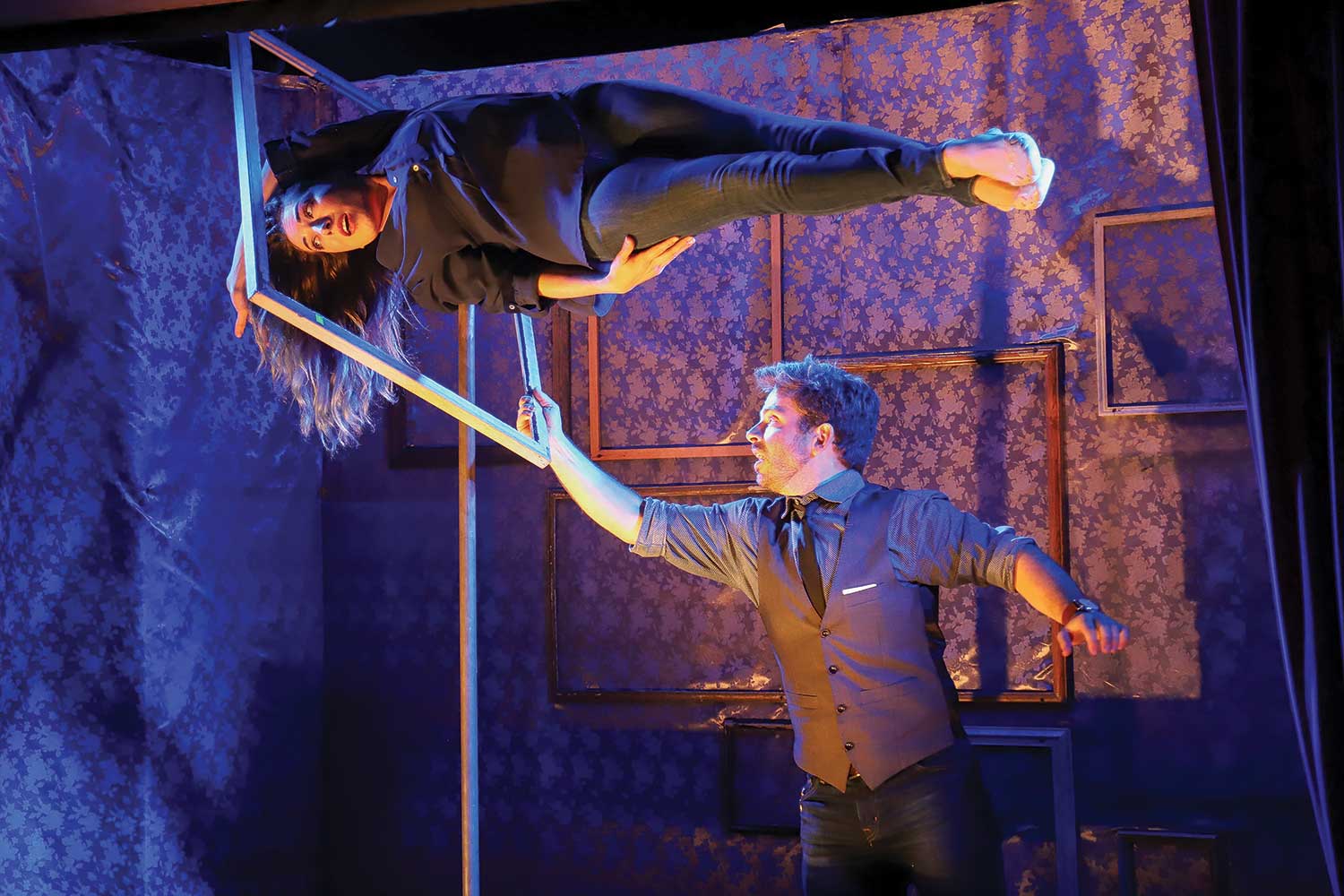 NEW TRICKS: Evans, right, with Aeva, is skeptical of the old sawing-a-woman-in-half gambit.