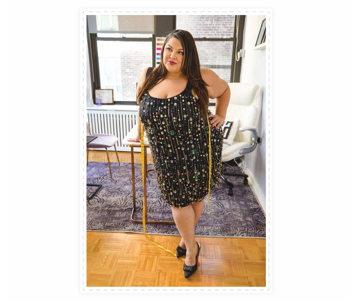 Cafaro wearing a beautiful dress in her office.