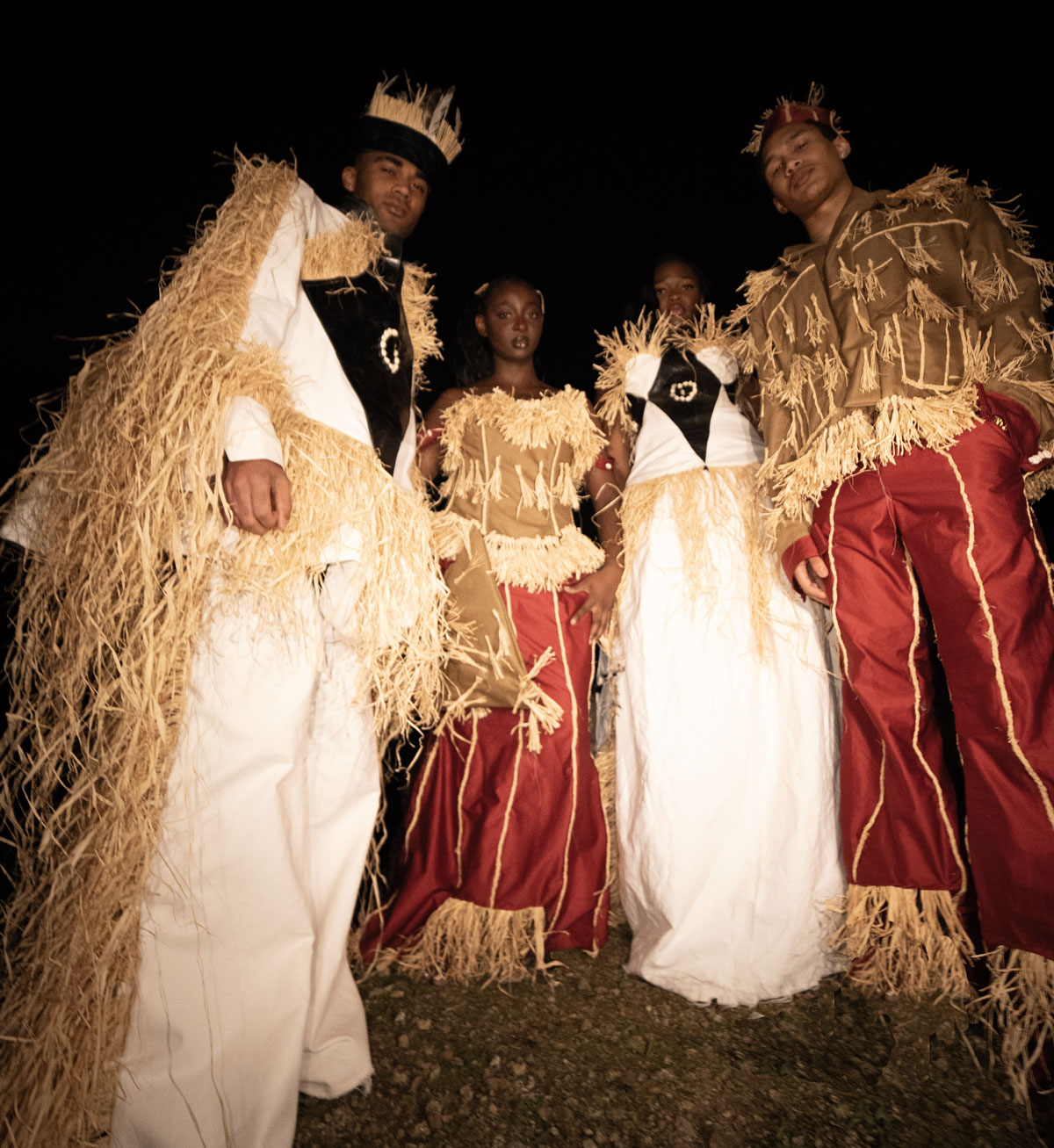 Photo showing fellow students modeling wearing Songolo’s first collection, called Emo (“one”), for his Luùndo brand.