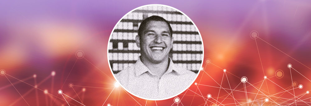 Headshot of Eutiquio “Tiq” Chapa against tiled background