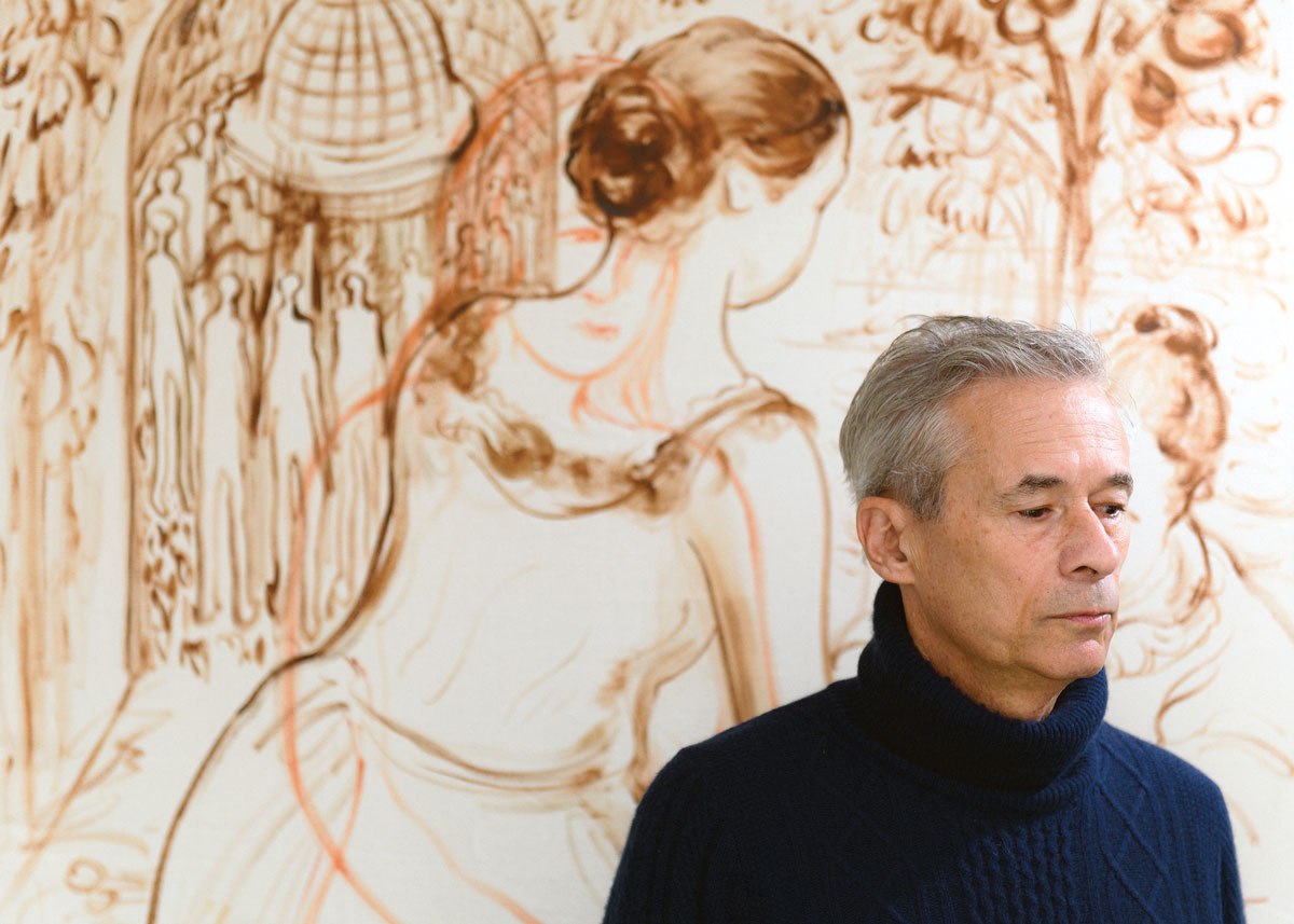 Nemerov in front of Yuchen Ge’s painting,  The Bakery on the Border on the wall of his office.  